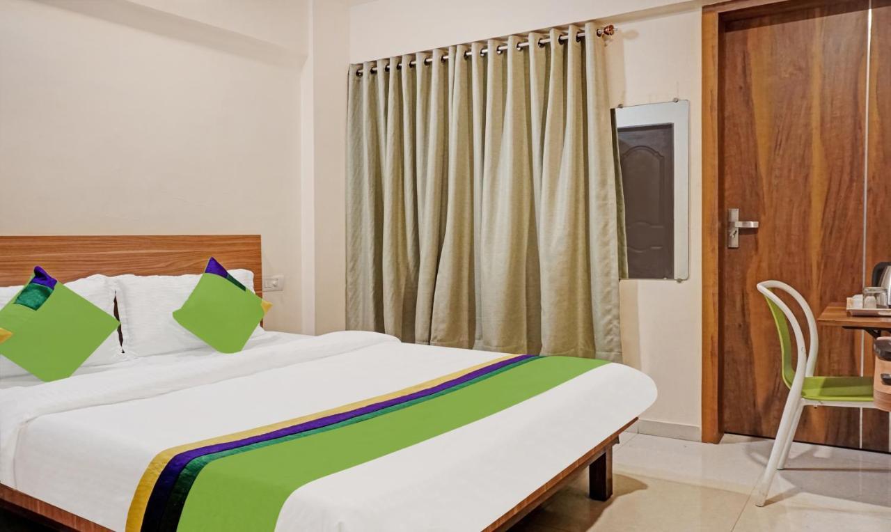 Hotel Treebo Trip Sai Krupa à Pune Extérieur photo
